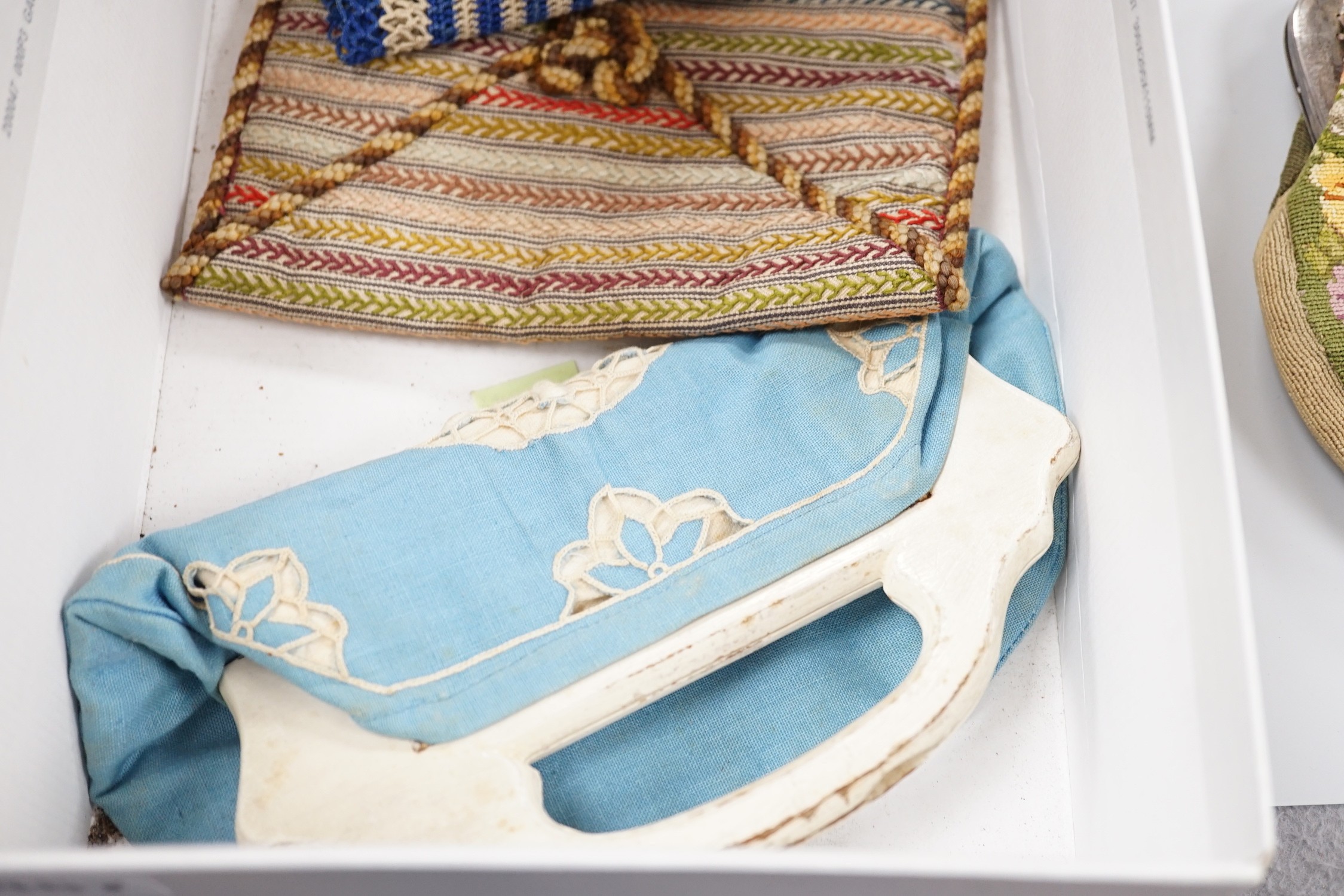 A collection of 19th and early 20th century crochet, embroidered and beaded reticules, evening bags and bible bags